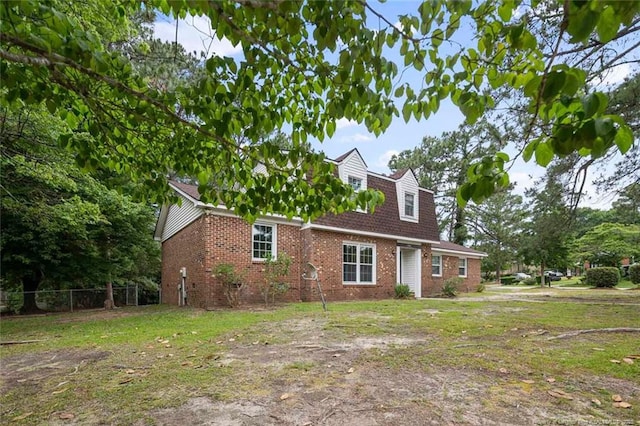 1720 Paisley Ave, Fayetteville, NC 28304 - view of front of house with brick siding and a shingled roof