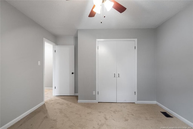 1720 Paisley Ave, Fayetteville, NC 28304 - unfurnished bedroom featuring carpet floors, baseboards, ceiling fan, and a closet