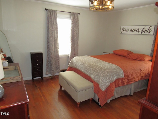 1700 Warrenton Rd, Henderson, NC 27537 - bedroom with ornamental molding, wood finished floors, a chandelier, and baseboards