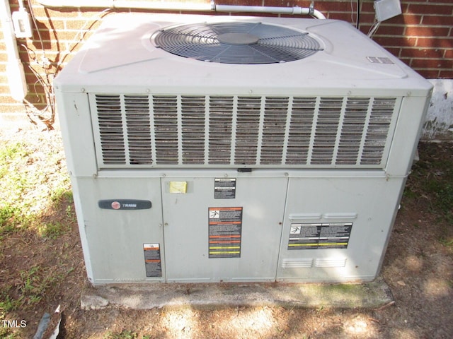 1700 Warrenton Rd, Henderson, NC 27537 - exterior view of central air condition unit and brick siding