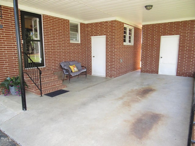 1700 Warrenton Rd, Henderson, NC 27537 - view of patio with entry steps and a carport