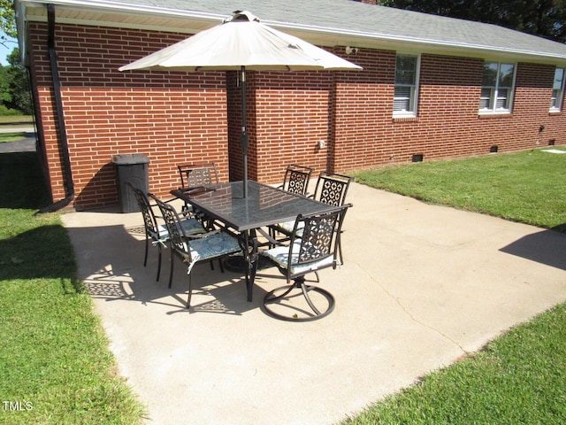 1700 Warrenton Rd, Henderson, NC 27537 - view of patio featuring outdoor dining space
