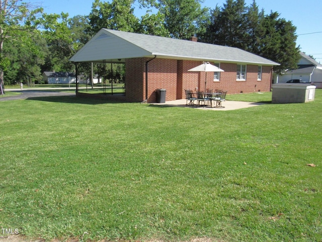 1700 Warrenton Rd, Henderson, NC 27537 - surrounding community featuring a yard and a patio area