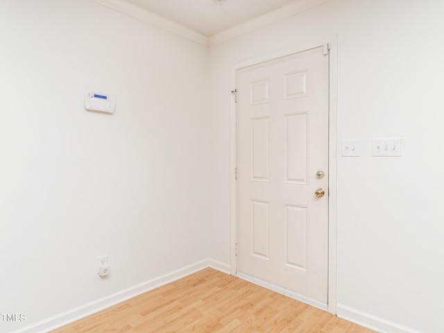 6304 Bermuda Way, Whitsett, NC 27377 - spare room with light wood-style flooring and ornamental molding