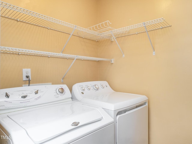 6304 Bermuda Way, Whitsett, NC 27377 - washroom with washing machine and dryer