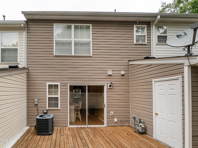 6304 Bermuda Way, Whitsett, NC 27377 - rear view of property featuring a wooden deck