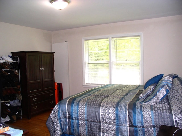 1809 S Garnett Ext, Henderson, NC 27536 - bedroom featuring dark wood-style floors