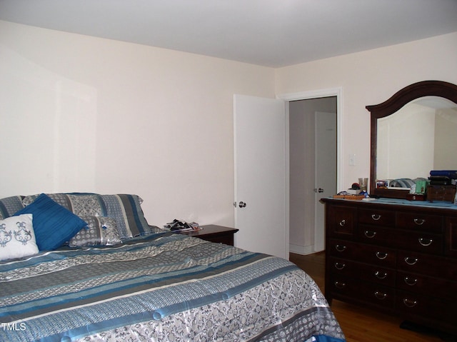 1809 S Garnett Ext, Henderson, NC 27536 - bedroom featuring dark wood-style floors
