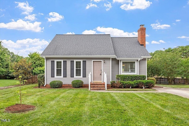 1228 Shakentown St, Knightdale, NC 27545 - view of front of home featuring a chimney and a shingled roof