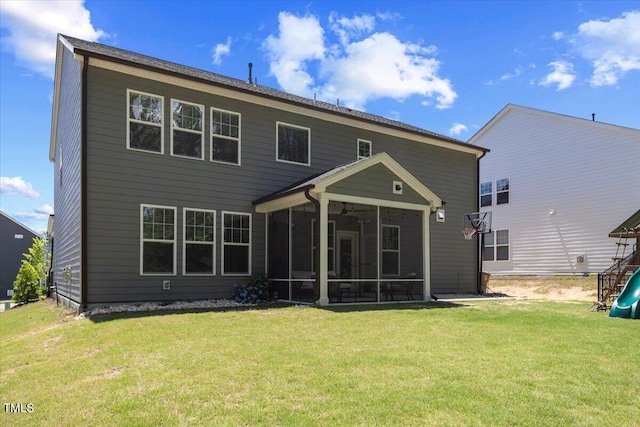 2009 Latham Oaks Ave, Wake Forest, NC 27587 - rear view of property with a sunroom and a yard