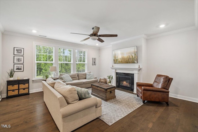 2009 Latham Oaks Ave, Wake Forest, NC 27587 - living room with dark wood finished floors, a glass covered fireplace, a ceiling fan, baseboards, and recessed lighting