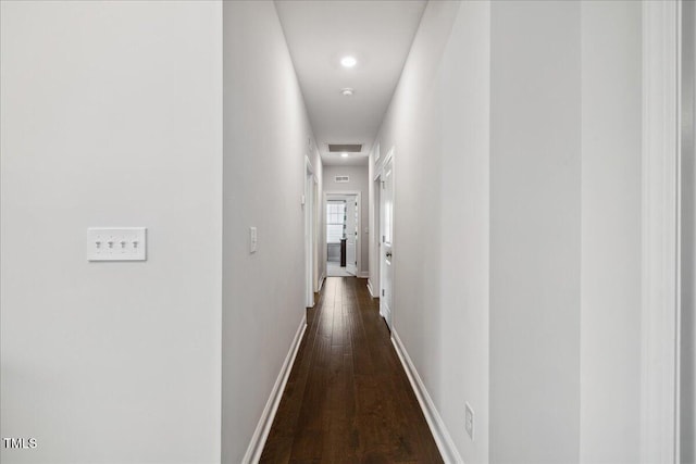 2009 Latham Oaks Ave, Wake Forest, NC 27587 - corridor featuring dark wood-type flooring, recessed lighting, and baseboards