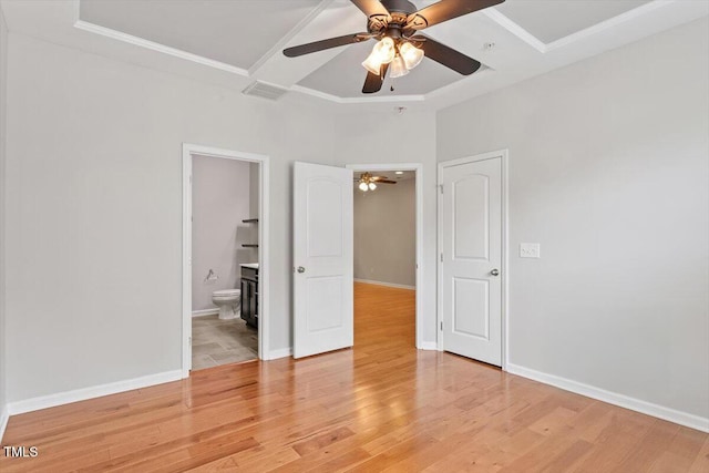 9327 Falkwood Rd, Raleigh, NC 27617 - unfurnished bedroom featuring light wood-type flooring, ensuite bathroom, ceiling fan, baseboards, and crown molding