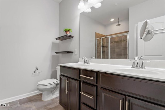 9327 Falkwood Rd, Raleigh, NC 27617 - full bathroom with a shower stall, double vanity, toilet, and baseboards