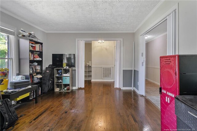 7578 Firethorn Dr, Fayetteville, NC 28311 - office area featuring hardwood / wood-style floors, a textured ceiling, crown molding, and baseboards
