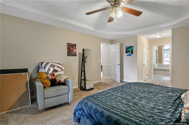 7578 Firethorn Dr, Fayetteville, NC 28311 - carpeted bedroom with a textured ceiling, crown molding, baseboards, ensuite bath, and a ceiling fan