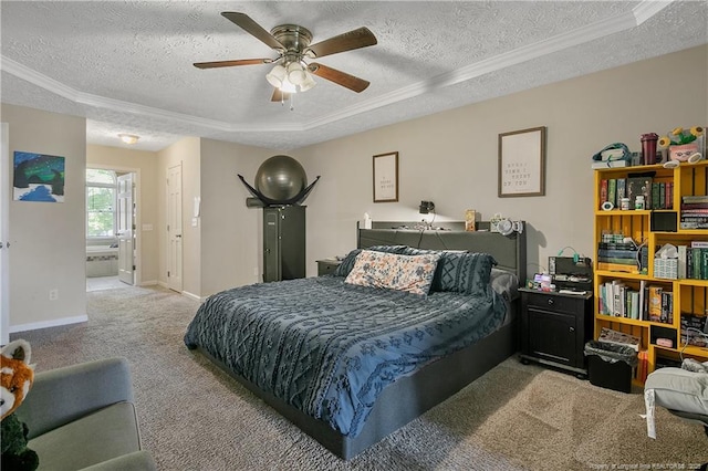 7578 Firethorn Dr, Fayetteville, NC 28311 - bedroom with a textured ceiling, crown molding, carpet floors, a raised ceiling, and baseboards