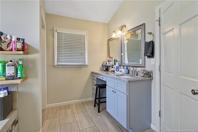 7578 Firethorn Dr, Fayetteville, NC 28311 - bathroom with vanity and baseboards