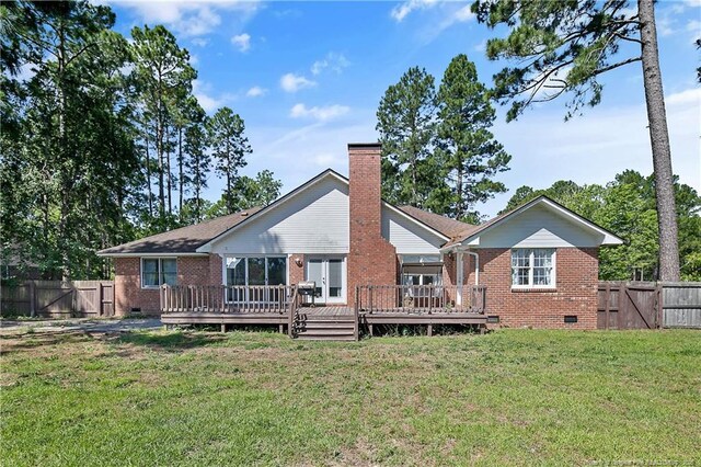 7578 Firethorn Dr, Fayetteville, NC 28311 - rear view of property with crawl space, brick siding, and a wooden deck