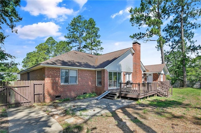 7578 Firethorn Dr, Fayetteville, NC 28311 - back of house with crawl space, brick siding, a deck, a gate, and a chimney
