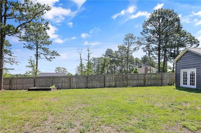 7578 Firethorn Dr, Fayetteville, NC 28311 - view of yard with french doors