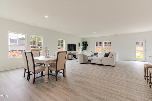 6762 Hardwick Ln, Sims, NC 27880 - dining space with light wood-type flooring, baseboards, and recessed lighting
