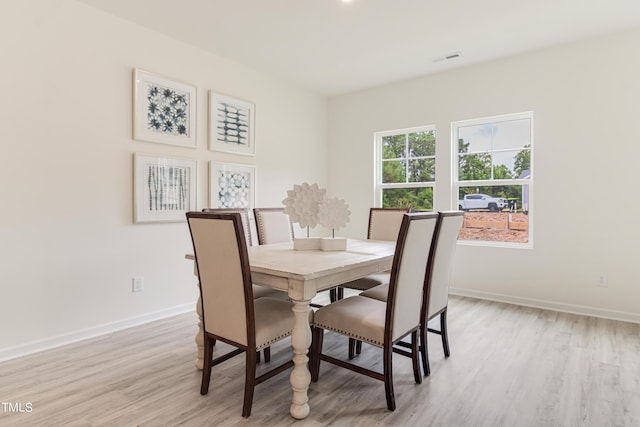 6762 Hardwick Ln, Sims, NC 27880 - dining space with light wood-style floors and baseboards