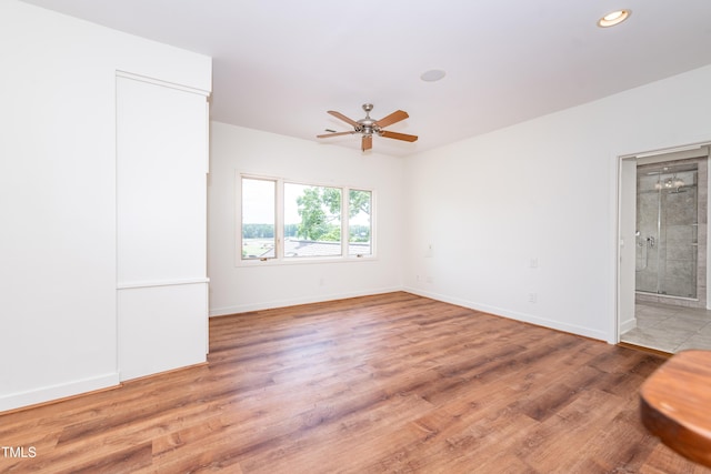 112 Lancaster Dr, Chapel Hill, NC 27517 - empty room featuring ceiling fan, baseboards, light wood-style flooring, and recessed lighting