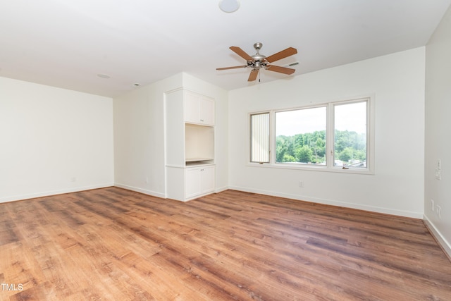 112 Lancaster Dr, Chapel Hill, NC 27517 - spare room with light wood-style floors, a ceiling fan, and baseboards