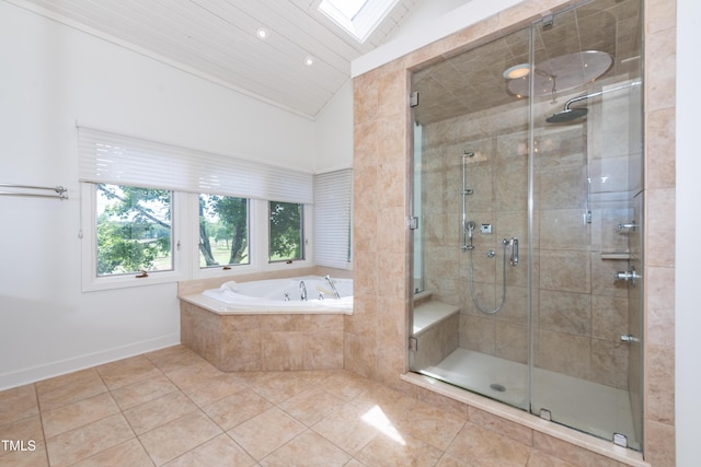 112 Lancaster Dr, Chapel Hill, NC 27517 - full bath featuring lofted ceiling, tile patterned flooring, a garden tub, a stall shower, and a skylight