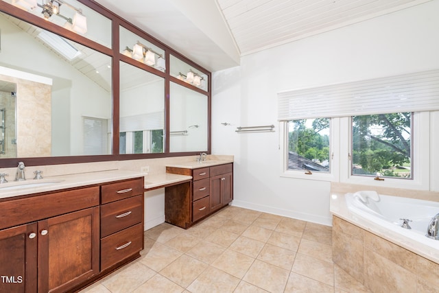 112 Lancaster Dr, Chapel Hill, NC 27517 - bathroom with lofted ceiling, vanity, tile patterned floors, a garden tub, and tiled shower