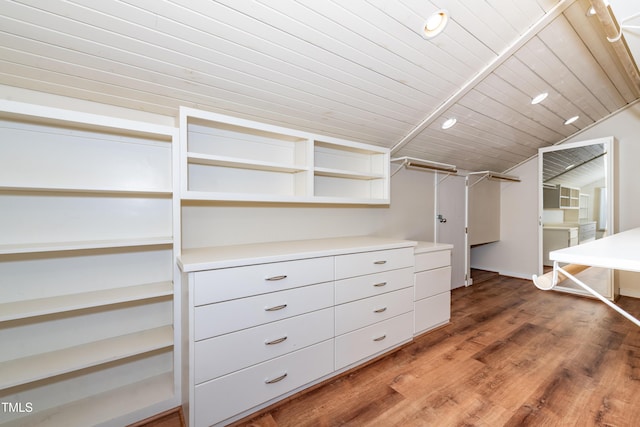 112 Lancaster Dr, Chapel Hill, NC 27517 - walk in closet featuring wood finished floors and vaulted ceiling