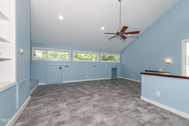 112 Lancaster Dr, Chapel Hill, NC 27517 - unfurnished living room with vaulted ceiling, ceiling fan, wood finished floors, and baseboards
