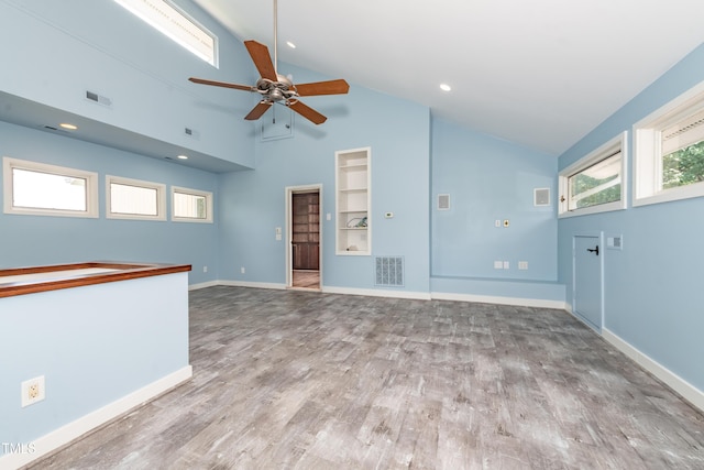 112 Lancaster Dr, Chapel Hill, NC 27517 - spare room featuring ceiling fan, vaulted ceiling, wood finished floors, baseboards, and built in features