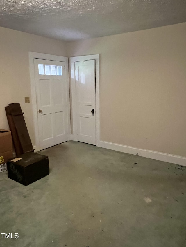 806 Ethelored St, Fayetteville, NC 28303 - entrance foyer with baseboards and concrete flooring