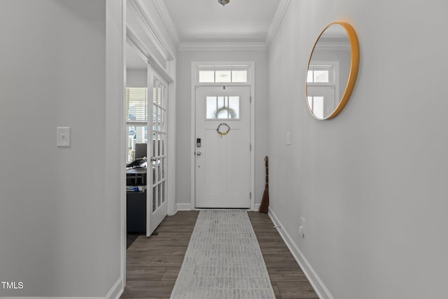 604 Craftsman Ridge Trl, Knightdale, NC 27545 - entrance foyer featuring crown molding, baseboards, and dark wood-style flooring