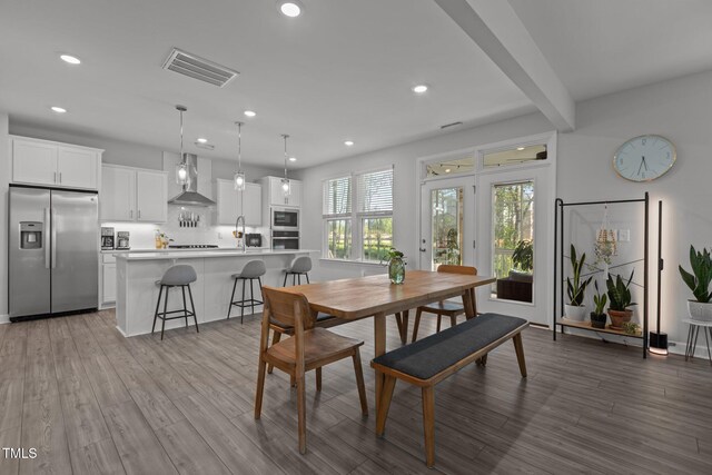 604 Craftsman Ridge Trl, Knightdale, NC 27545 - dining space with wood finished floors and recessed lighting