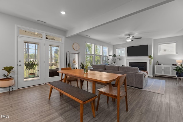 604 Craftsman Ridge Trl, Knightdale, NC 27545 - dining area with wood finished floors, a fireplace, recessed lighting, and ceiling fan