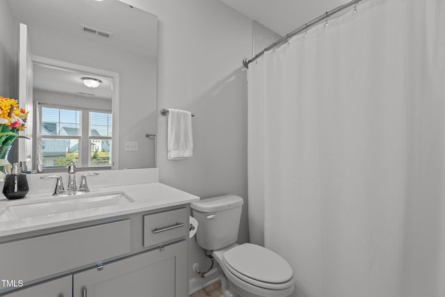 604 Craftsman Ridge Trl, Knightdale, NC 27545 - bathroom with vanity, toilet, and curtained shower
