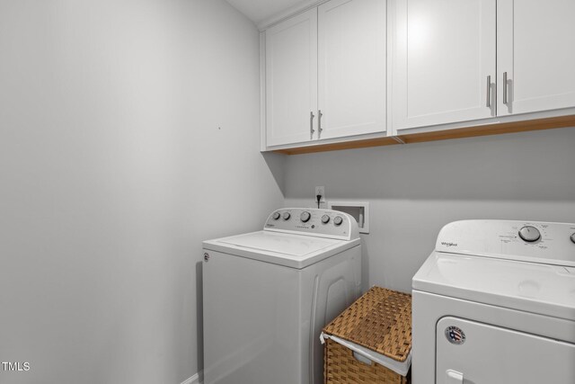 604 Craftsman Ridge Trl, Knightdale, NC 27545 - laundry room featuring washer and dryer and cabinet space
