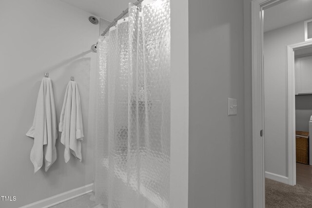 604 Craftsman Ridge Trl, Knightdale, NC 27545 - full bath with baseboards and a shower with shower curtain