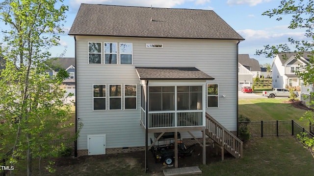 604 Craftsman Ridge Trl, Knightdale, NC 27545 - back of property featuring a sunroom, roof with shingles, and stairs