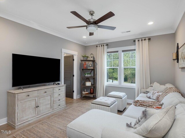 67 Spring Hollow Ct, Pittsboro, NC 27312 - living area with a ceiling fan, light wood-style flooring, baseboards, recessed lighting, and crown molding