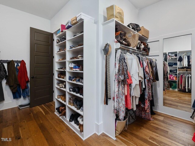 67 Spring Hollow Ct, Pittsboro, NC 27312 - spacious closet featuring wood finished floors