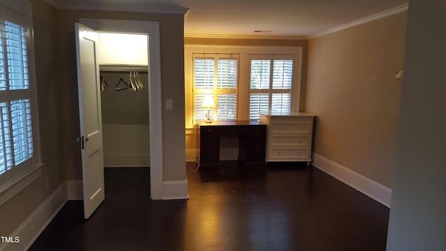 2236 The Cir, Raleigh, NC 27608 - bedroom with crown molding, baseboards, dark wood-style floors, and a closet