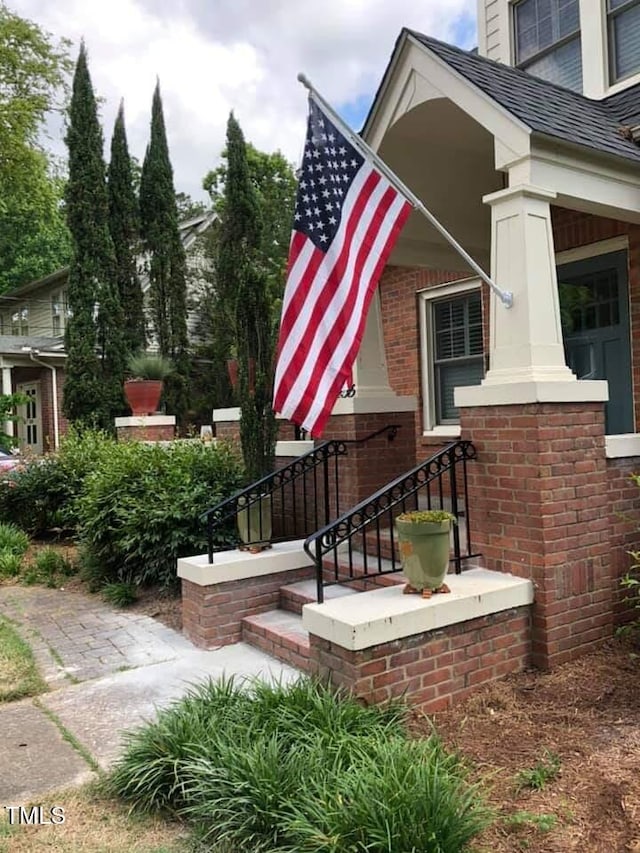 2236 The Cir, Raleigh, NC 27608 - view of exterior entry featuring brick siding