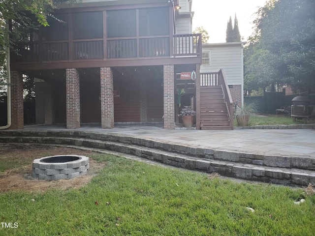 2236 The Cir, Raleigh, NC 27608 - back of house featuring an outdoor fire pit, a patio area, stairs, and brick siding