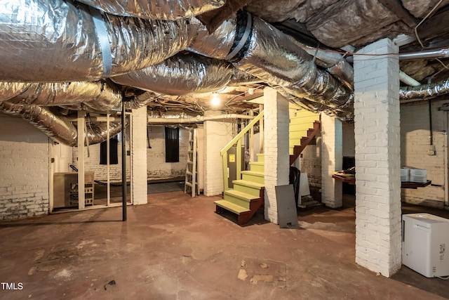 2236 The Cir, Raleigh, NC 27608 - unfinished basement featuring stairway and brick wall