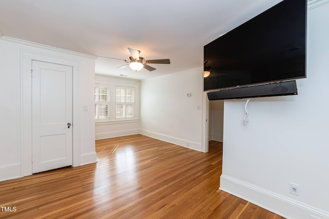 2236 The Cir, Raleigh, NC 27608 - unfurnished living room with a ceiling fan, baseboards, light wood-type flooring, and ornamental molding