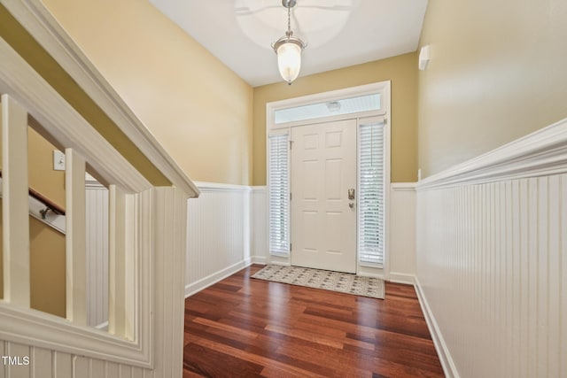 9808 Rainsong Dr, Wake Forest, NC 27587 - entryway featuring wood finished floors and a wainscoted wall